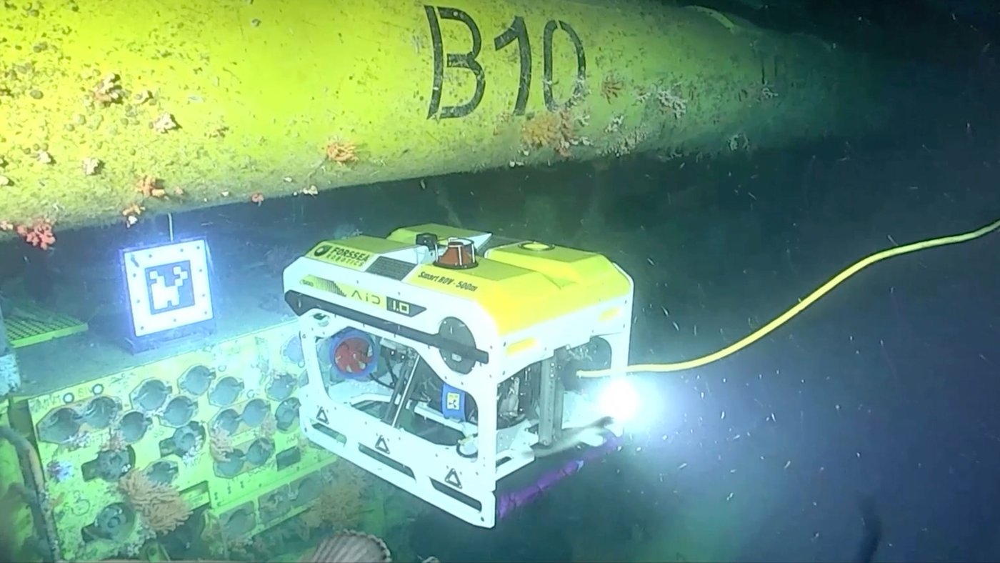 A remotely operated submersible monitoring energy infrastructure in the North Sea.